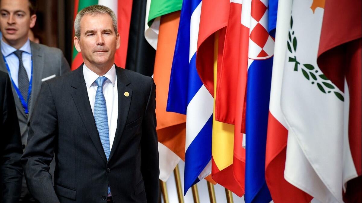 Austrian Chancellor Hartwig Loeger leaves a special EU summit in Brussels on May 28.