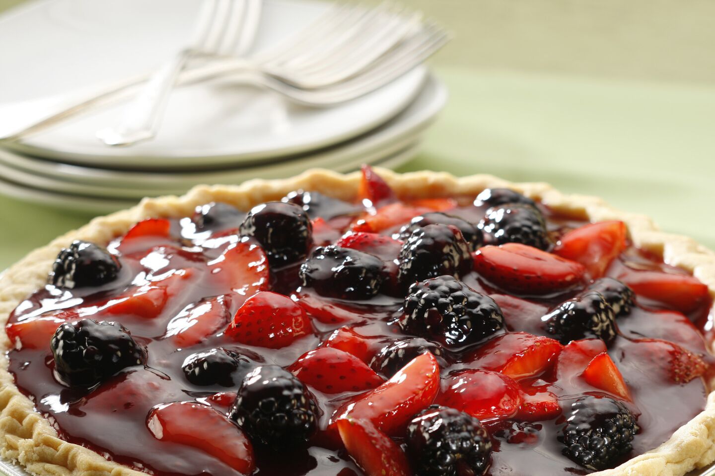 Boysenberry-strawberry glazed pie