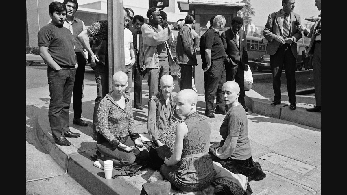 Throughout the nine-month Manson trial, some of his followers camped outside the courthouse, heads shaved and Xs carved into their foreheads.