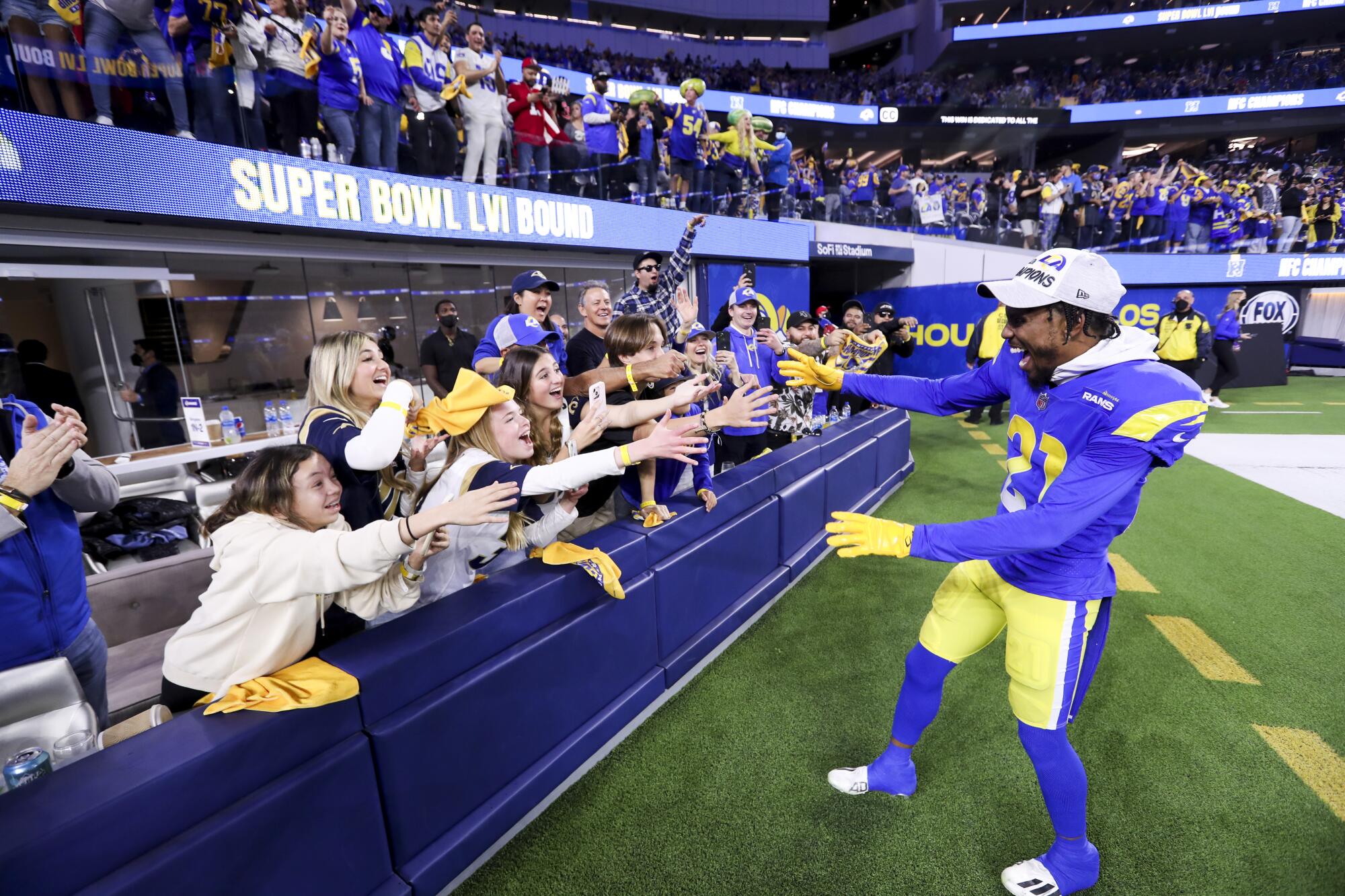 Rams cornerback Donte' Deayon meets with fans after defeating the San Francisco 49ers in the NFC championship.