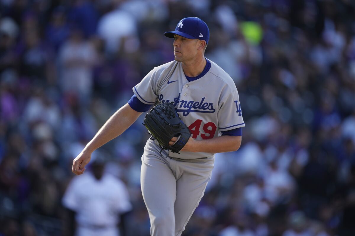 Los Angeles Dodgers relief pitcher Blake Treinen (49) in the seventh inning of a baseball game.