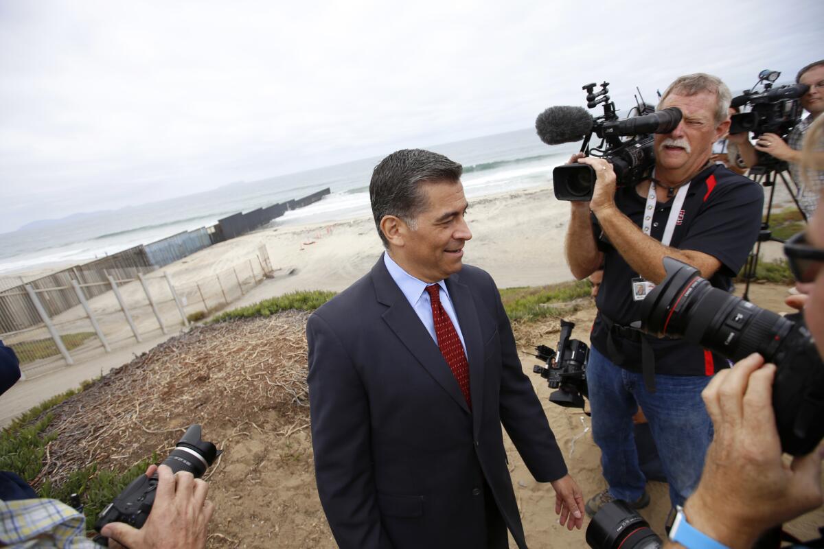 Atty. Gen. Xavier Becerra at the U.S.- Mexico border where he announced lawsuit to stop a proposal for a border wall.
