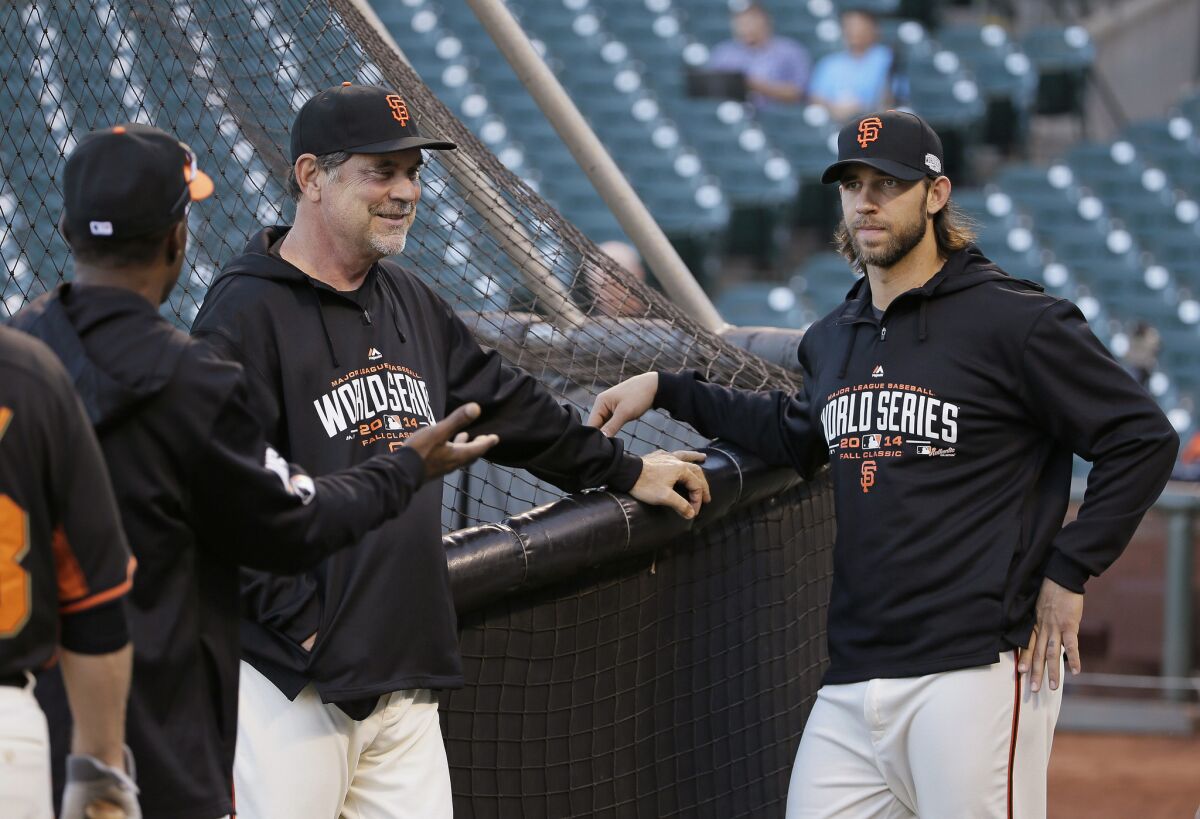 San Francisco Manager Bruce Bochy and pitcher Madison Bumgarner, shown during a team workout on Thursday, both said there was never a plan for Bumgarner to pitch Saturday on short rest.