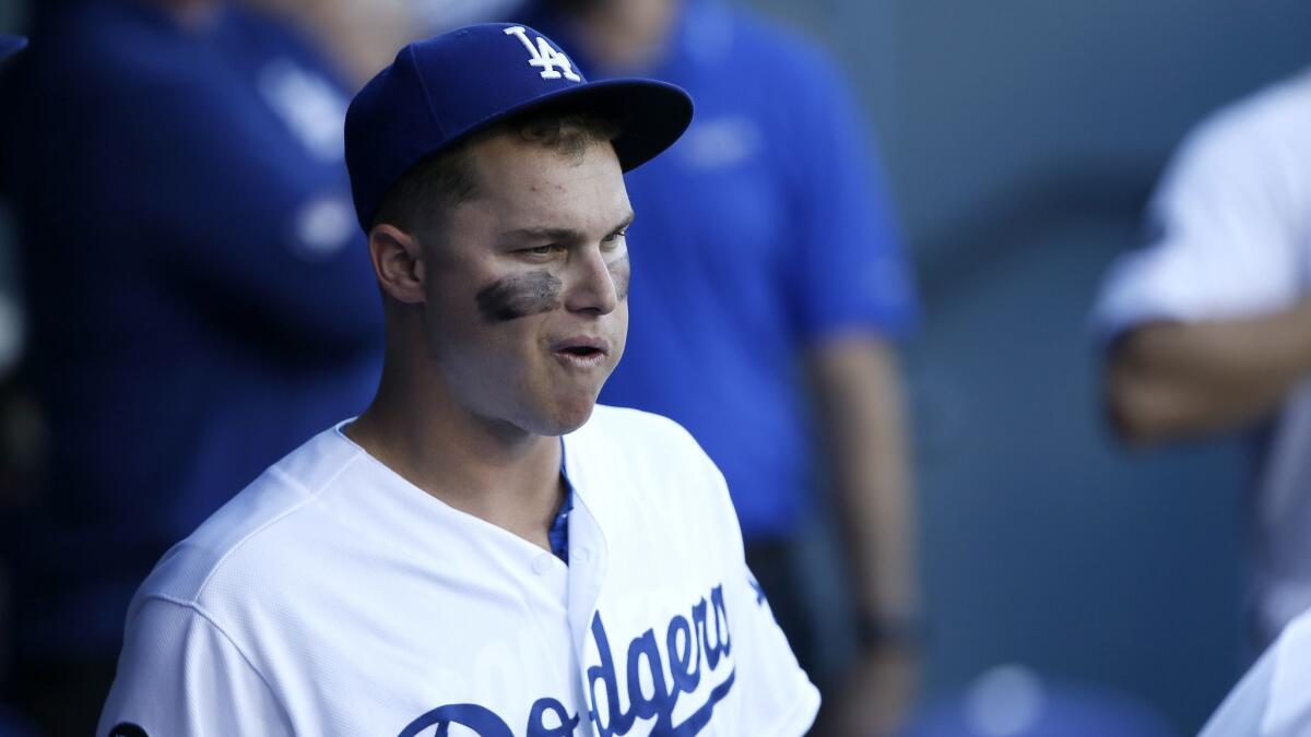 Joc Pederson prepares to take the field before a game between the Dodgers and Cubs on Saturday. Pederson will soon be playing at first base for the Dodgers.