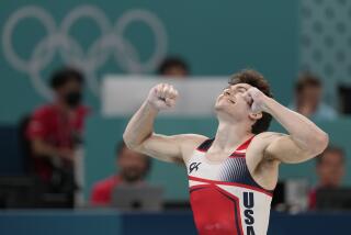 Stephen Nedoroscik, of the United States, celebrates during the men's artistic gymnastics.