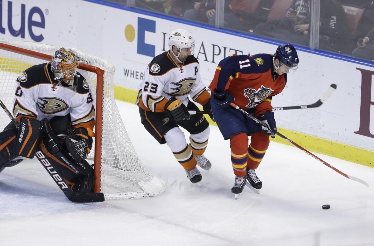 Ducks defensman Francois Beauchemin tries to keep up with Panthers center Jonathan Huberdeau while Ducks goalie Ilya Bryzgalov watches the puck during a Feb. 10 game in Sunrise, Fla.