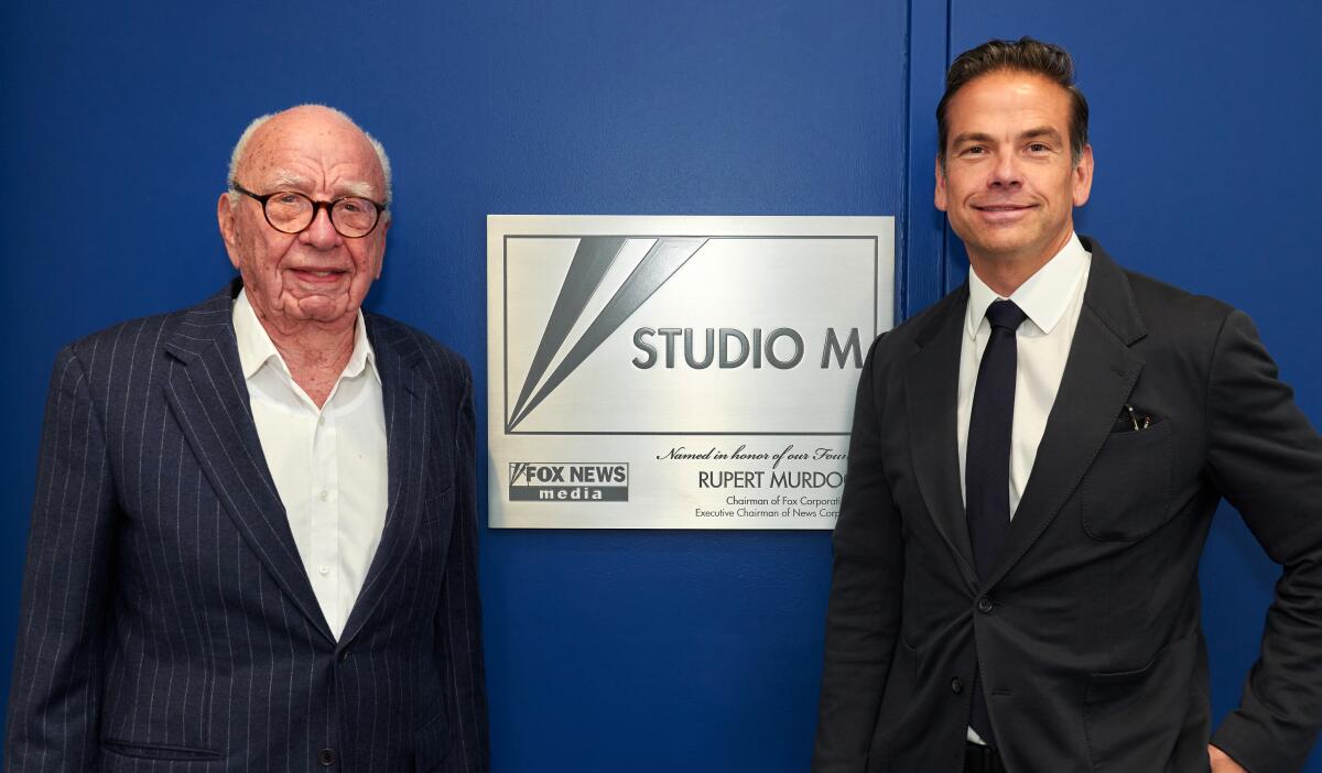 Rupert Murdoch and his son, Lachlan Murdoch, in 2021.