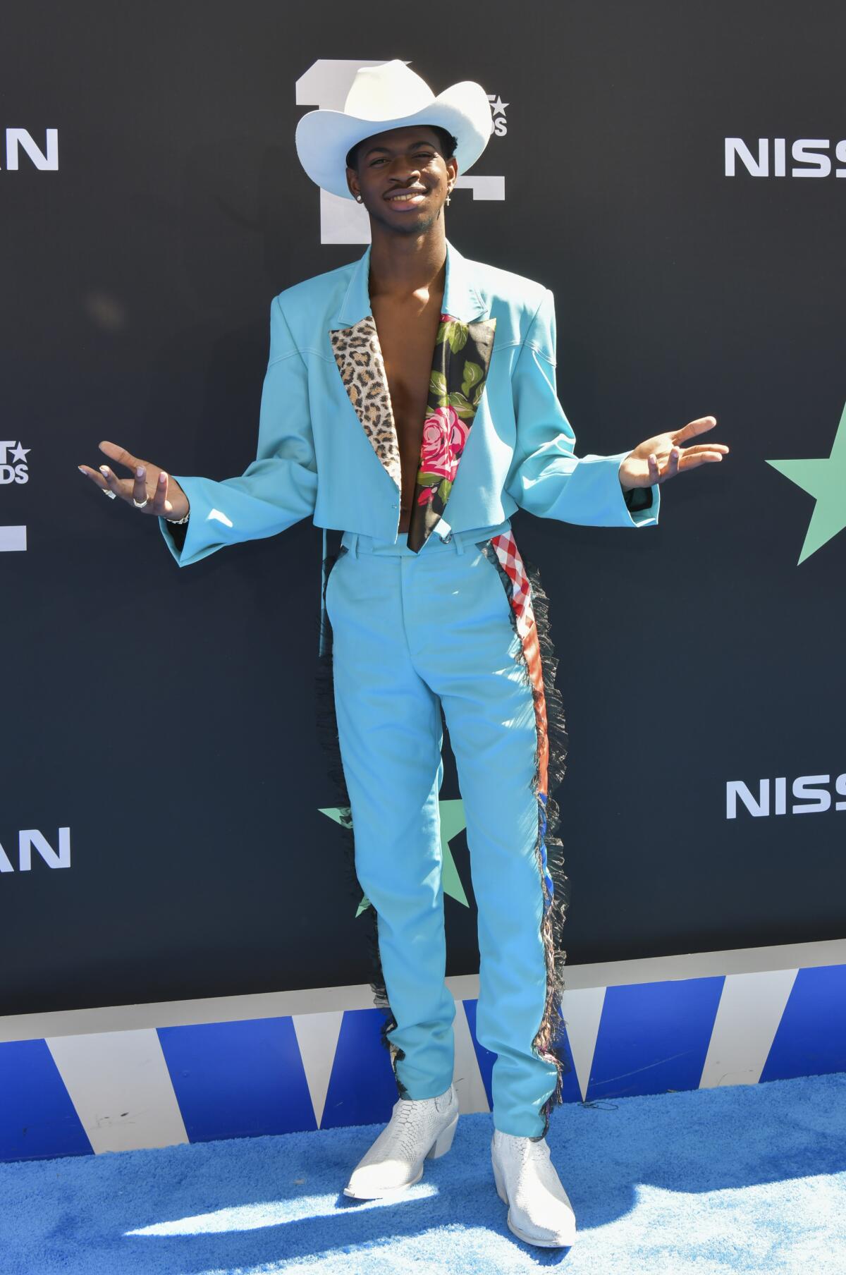 Lil Nas X in a custom Pyer Moss suit on the red carpet at the 2019 BET Awards.  