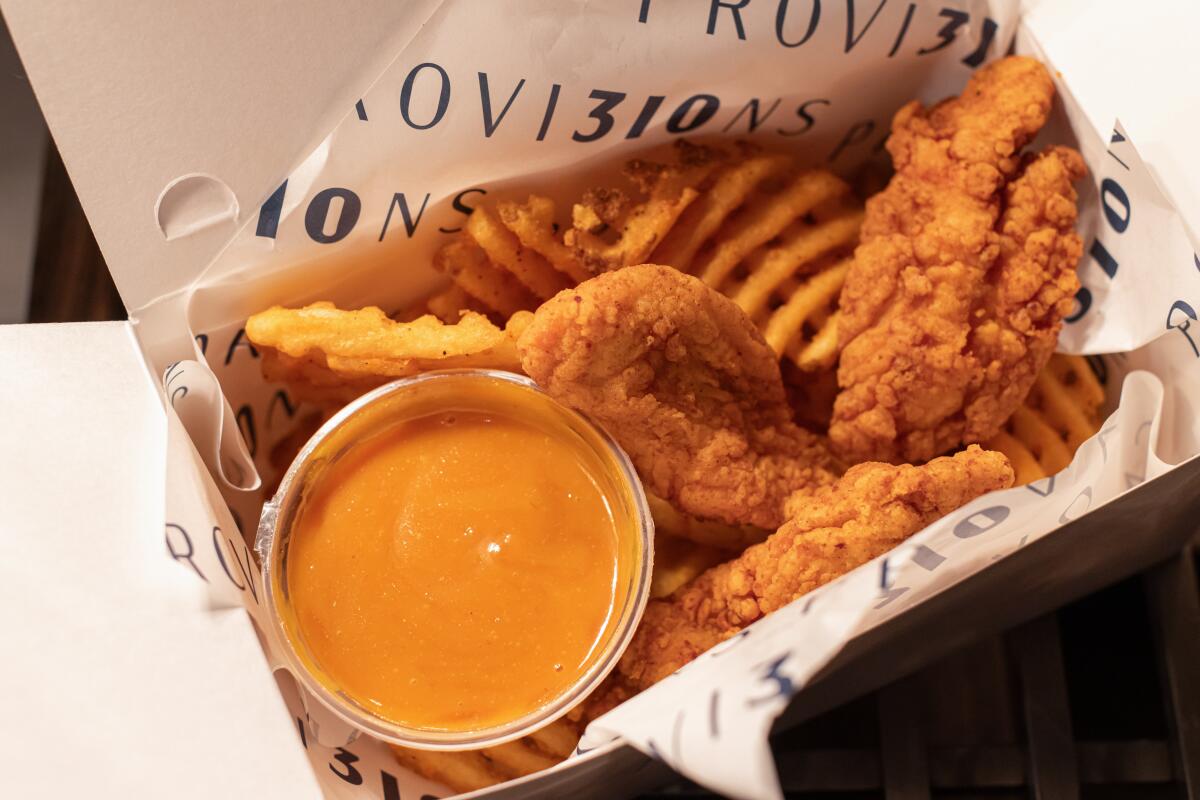 Chicken tenders and waffle fries will be served at the New Intuit Dome.