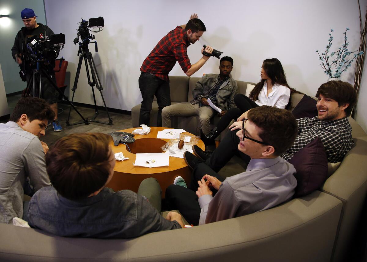 Cast members of Smosh film in online publisher Defy Media's studios in Beverly Hills last year.