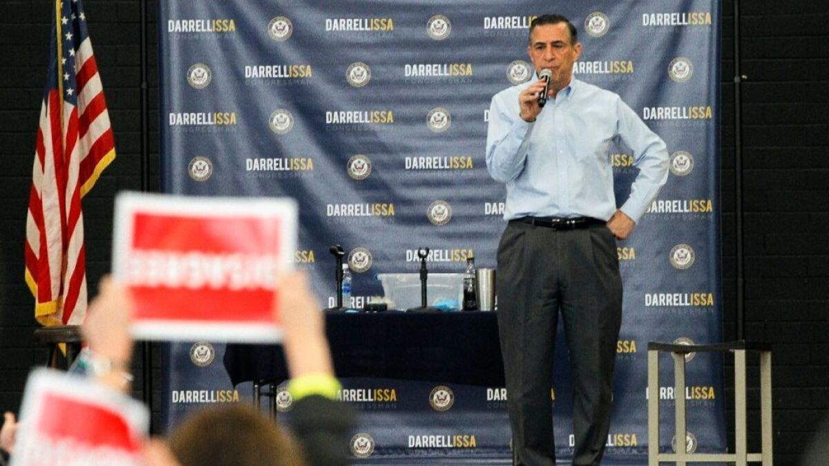 Rep. Darrell Issa (R-Vista) speaks at a town hall meeting to discuss healthcare reform in Oceanside on Saturday.