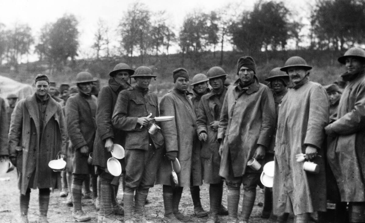 1918: Members of the division in early morning mess back near Verdun after 12 days of fighting in the Argonne-Meuse Offensive.