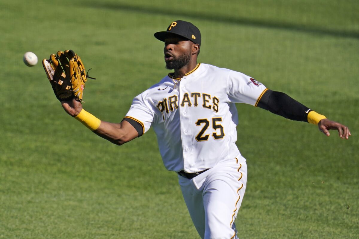 Pittsburgh Pirates right fielder Gregory Polanco catches a fly ball hit by Cincinnati Reds' Nick Castellanos off Pirates' starting pitcher Steven Brault during the first inning of a baseball game in Pittsburgh, Friday, Sept. 4, 2020. (AP Photo/Gene J. Puskar)