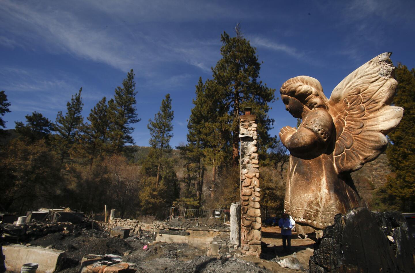 A ceramic angel is charred near the cabin on Seven Oaks Road in Angelus Oaks where former police officer Christopher Dorner died in a shootout with law enforcement. More: Times special report: The manhunt for Christopher Dorner