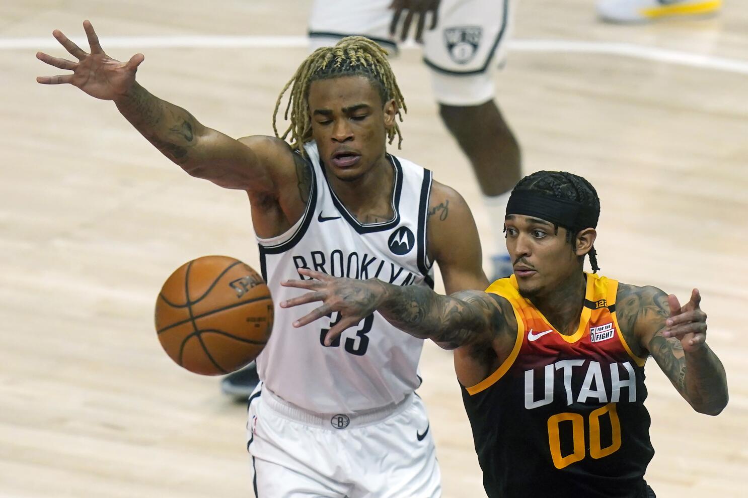 Watch Darius Garland connect with Donovan Mitchell on a lob pass