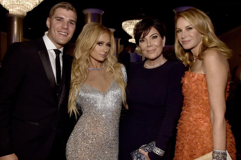 BEVERLY HILLS, CA - MAY 05: (L-R) Actor Chris Zylka, Paris Hilton, TV personality Kris Jenner and fashion designer Dee Ocleppo attend the 24th Annual Race To Erase MS Gala at The Beverly Hilton Hotel on May 5, 2017 in Beverly Hills, California. (Photo by Alberto E. Rodriguez/Getty Images for Race To Erase MS)