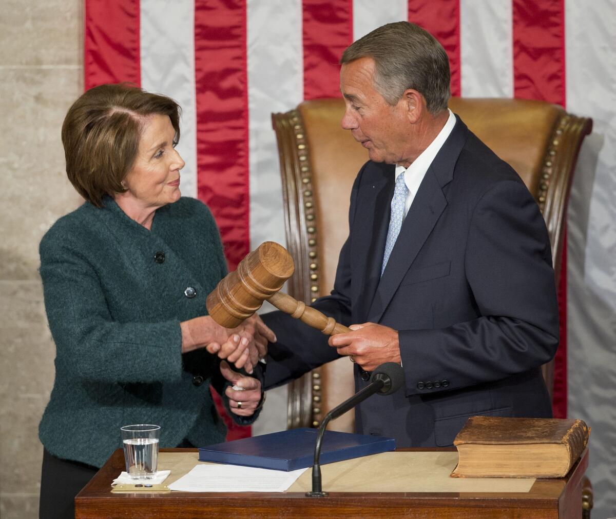 Signs that the gears are beginning to turn? House Minority Leader Nancy Pelosi (D-San Francisco) with House Speaker John A. Boehner (R-Ohio). The congressional leaders have worked out a tentative deal on Medicare and children's health.