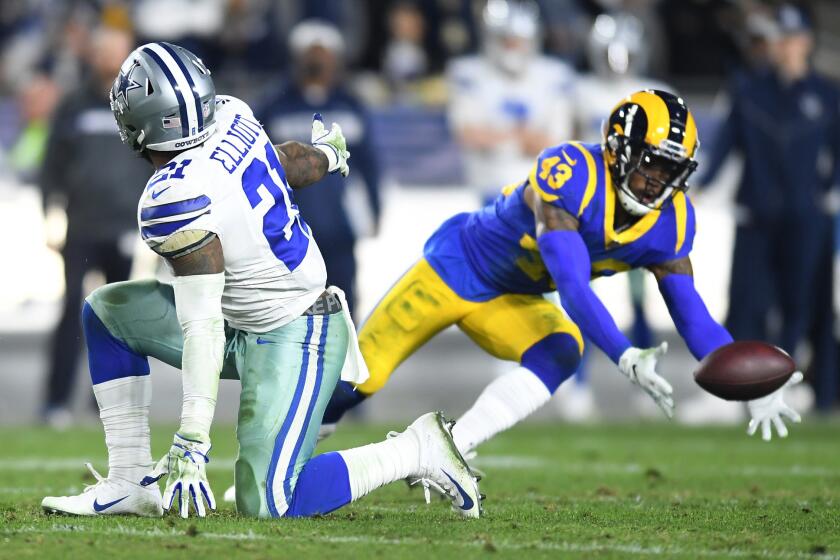 Rams safety John Johnson almost comes up with an interception on a pass intended for Cowboys running back Ezekiel Elliott.