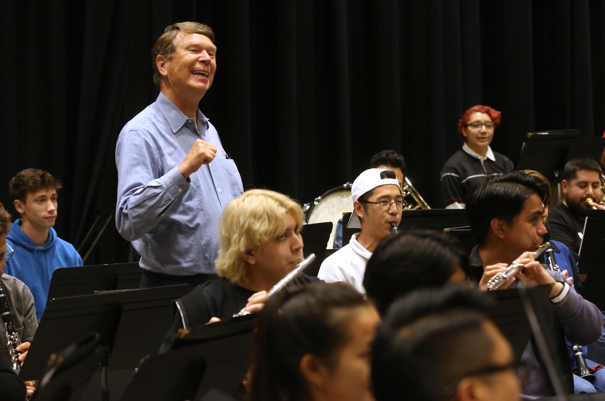 Steve Hauser, 76, smiles as his colleagues with the Heart of Los Angeles Eisner Intergenerational Orchestra.