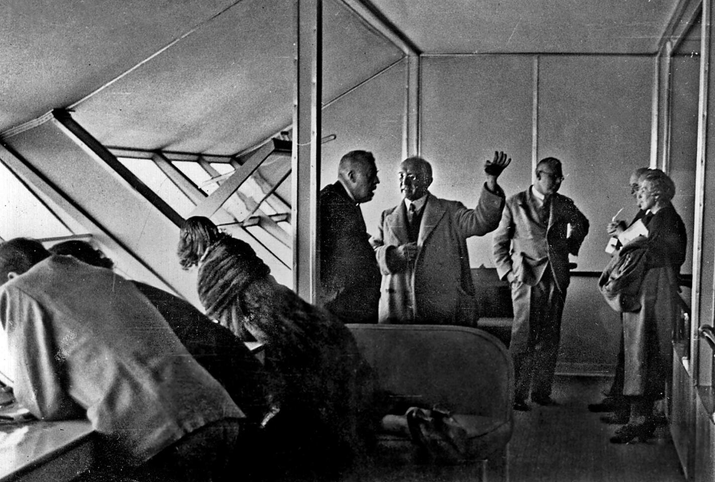 An old photo showing passengers aboard the Hindenburg during an Atlantic flight.