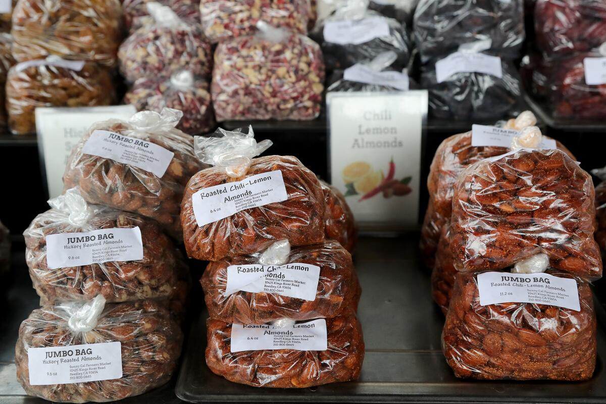 Roasted almonds by Sunny Cal farms for sale at the Irvine Regional Park Farmers Market.