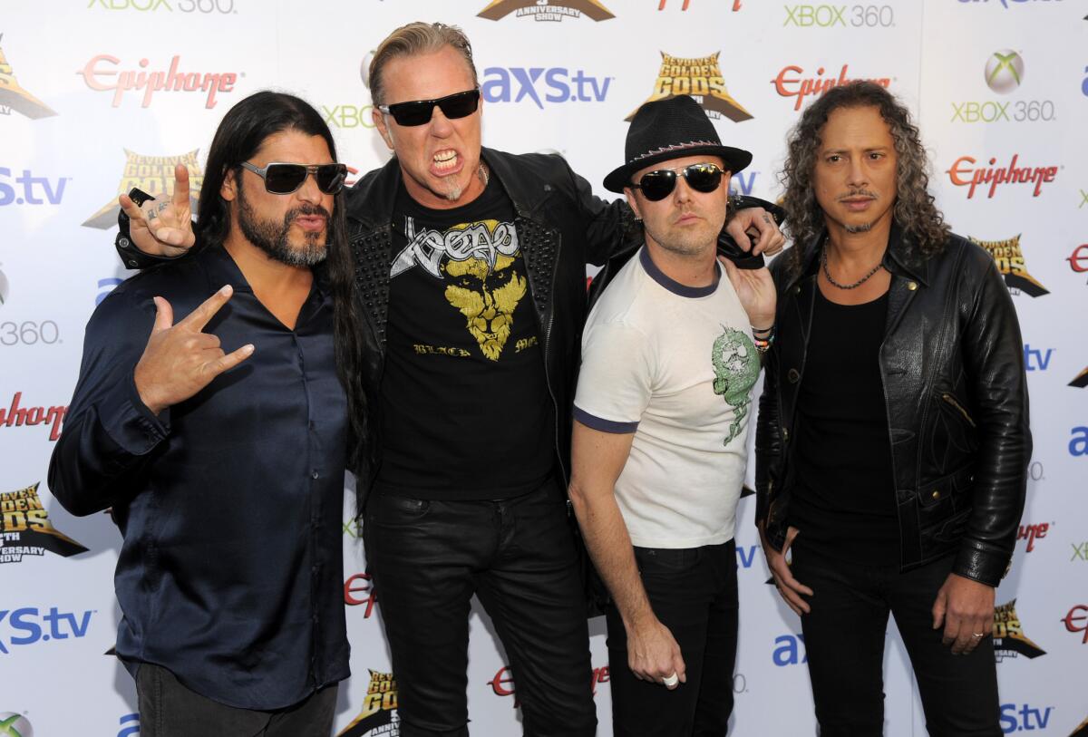 Metallica -- Robert Trujillo, left, James Hetfield, Lars Ulrich and Kirk Hammett -- have a new concert movie coming out.