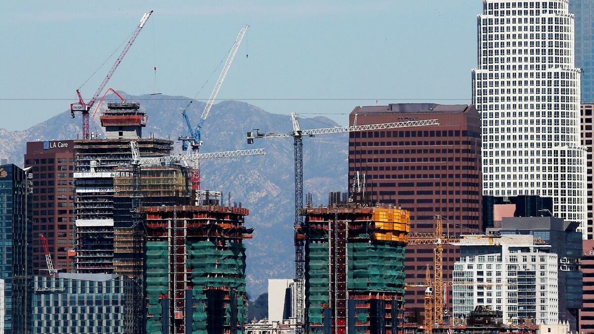 A survey of global real estate investors has found that Los Angeles, in the midst of a building boom, is one of the top choices this year for buying developed commercial property.