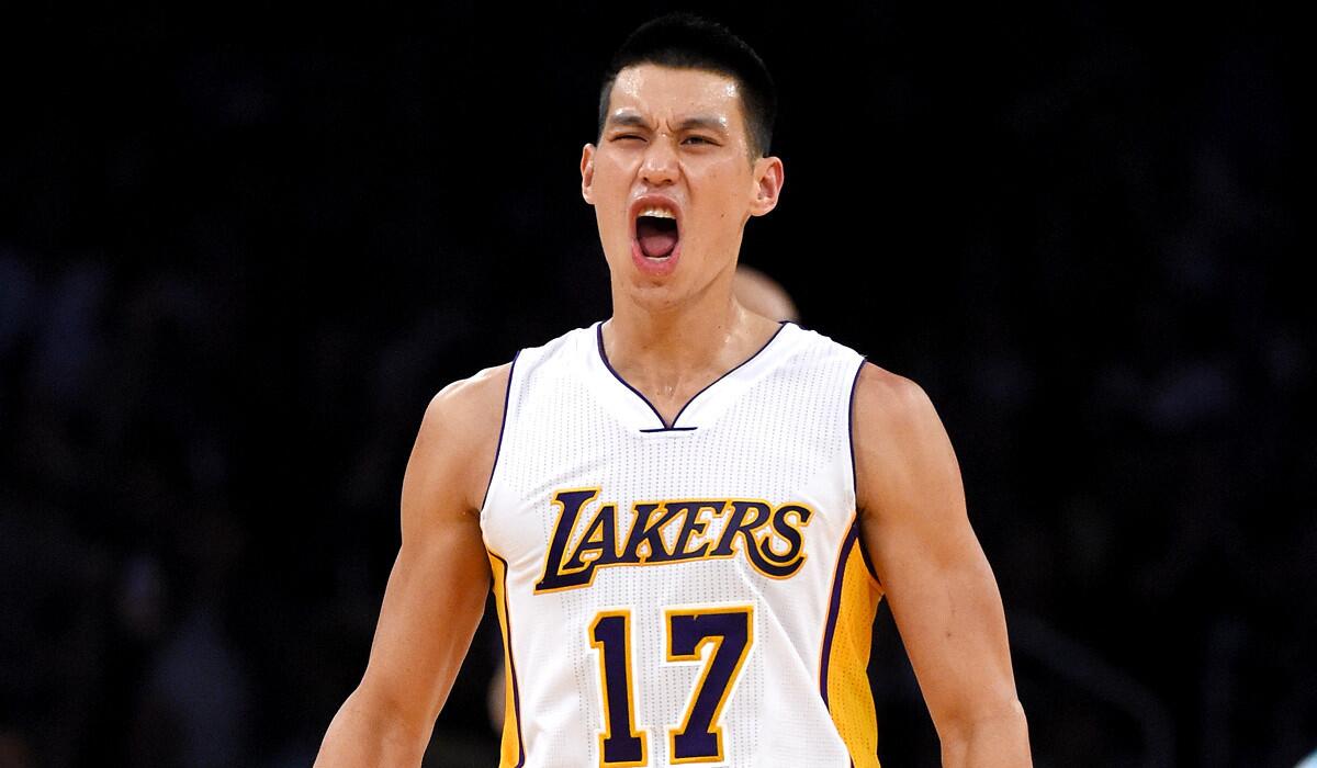 Lakers point guard Jeremy Lin reacts after hitting a three-pointer against the Hornets in the second half.