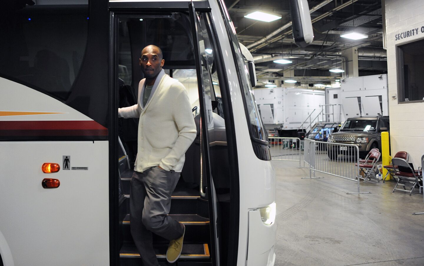 Laker Kobe Bryant arrives on the team bus before a game against the Rockets in Houston.