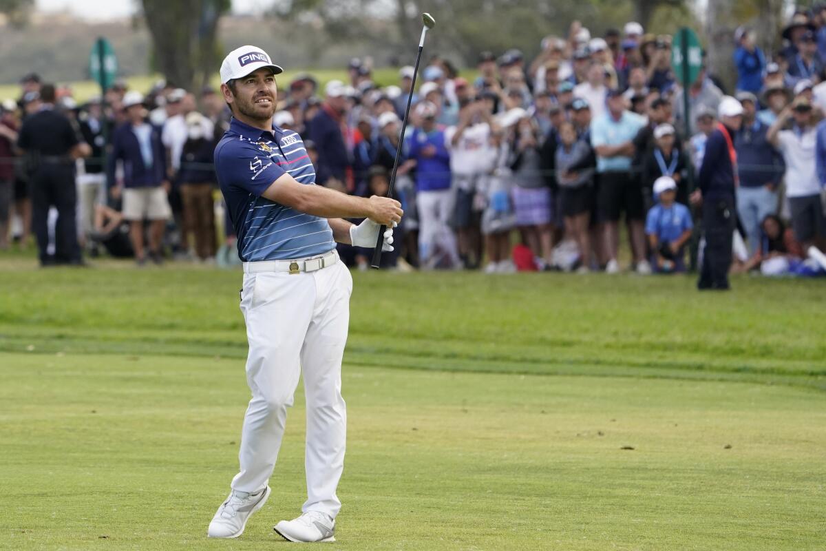 Louis Oosthuizen hits from the 18th fairway during the final round of the U.S. Open at Torrey Pines Golf Course on Sunday.