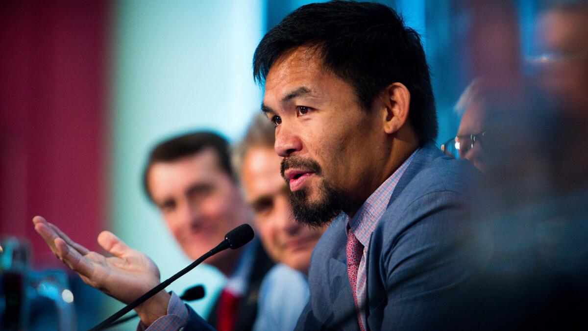 Manny Pacquiao addresses the media during a news conference Wednesday in Brisbane, Australia.