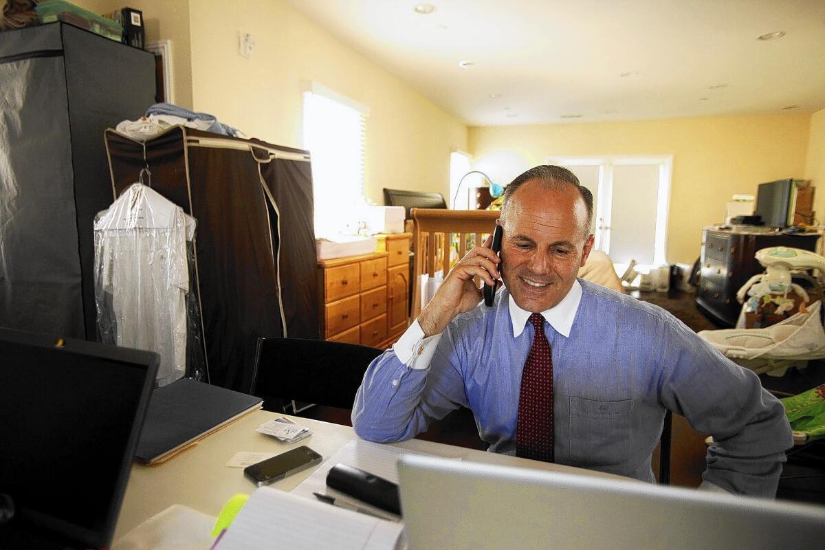 Gang prosecutor Elan Carr receives a concession call from Venice defense attorney David Kanuth a day after the primary election in which Carr placed first in a crowded field to replace Rep. Henry Waxman.