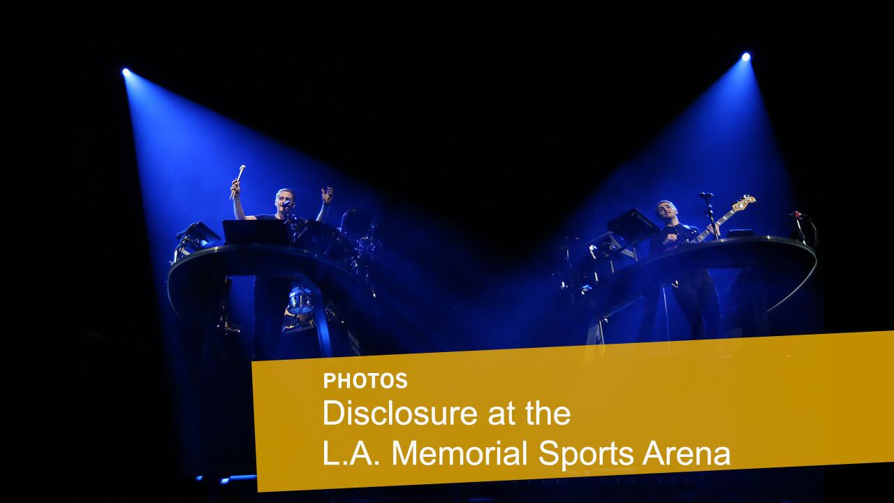 Guy Lawrence, left, and his brother Howard, of Disclosure, perform at the L.A. Memorial Sports Arena.