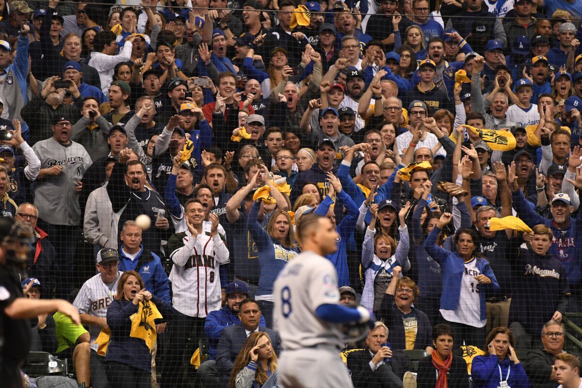 Brewer fans taunt Dodgers Manny Machado after he struck out in the fifth inning.