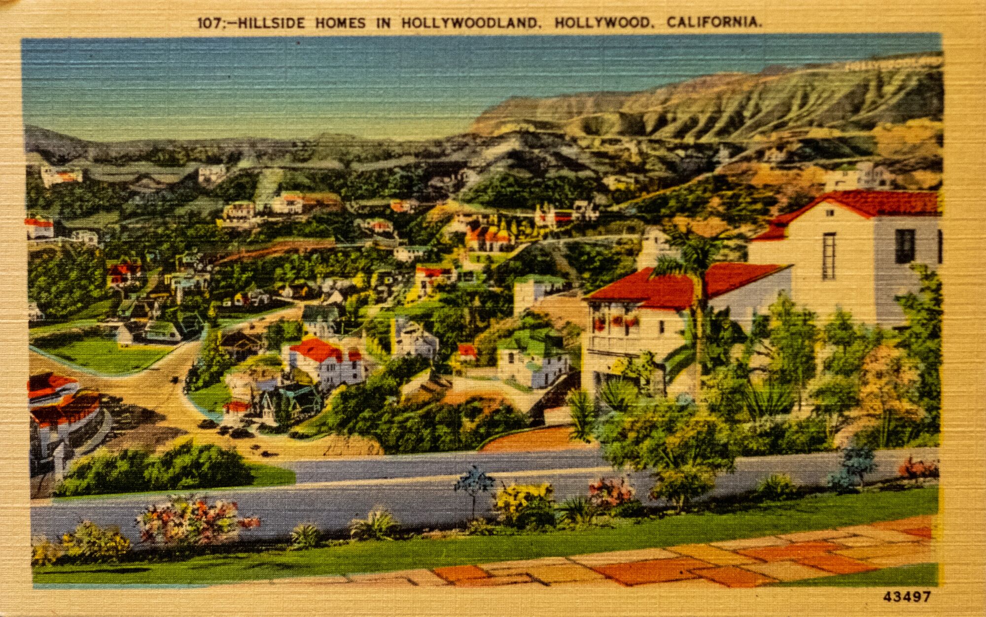 A historical postcard of the Hollywoodland residential district.