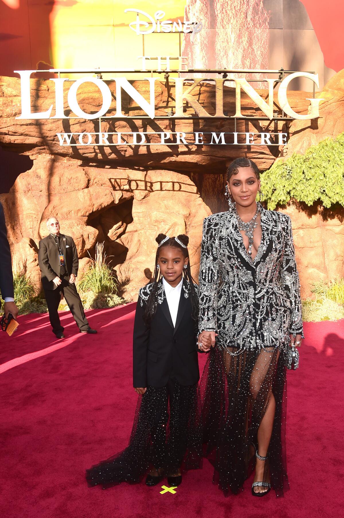 Blue Ivy Carter, left, and Beyonce Knowles-Carter attend the world premiere of Disney's "The Lion King" at the Dolby Theatre.
