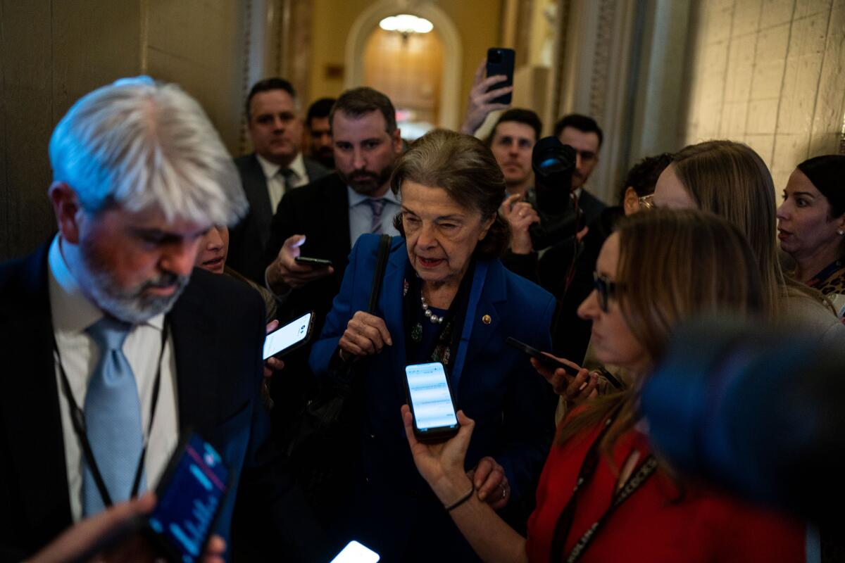 Sen. Dianne Feinstein speaks to reporters as she arrives at the U.S. Capitol for a vote on Feb. 14. 