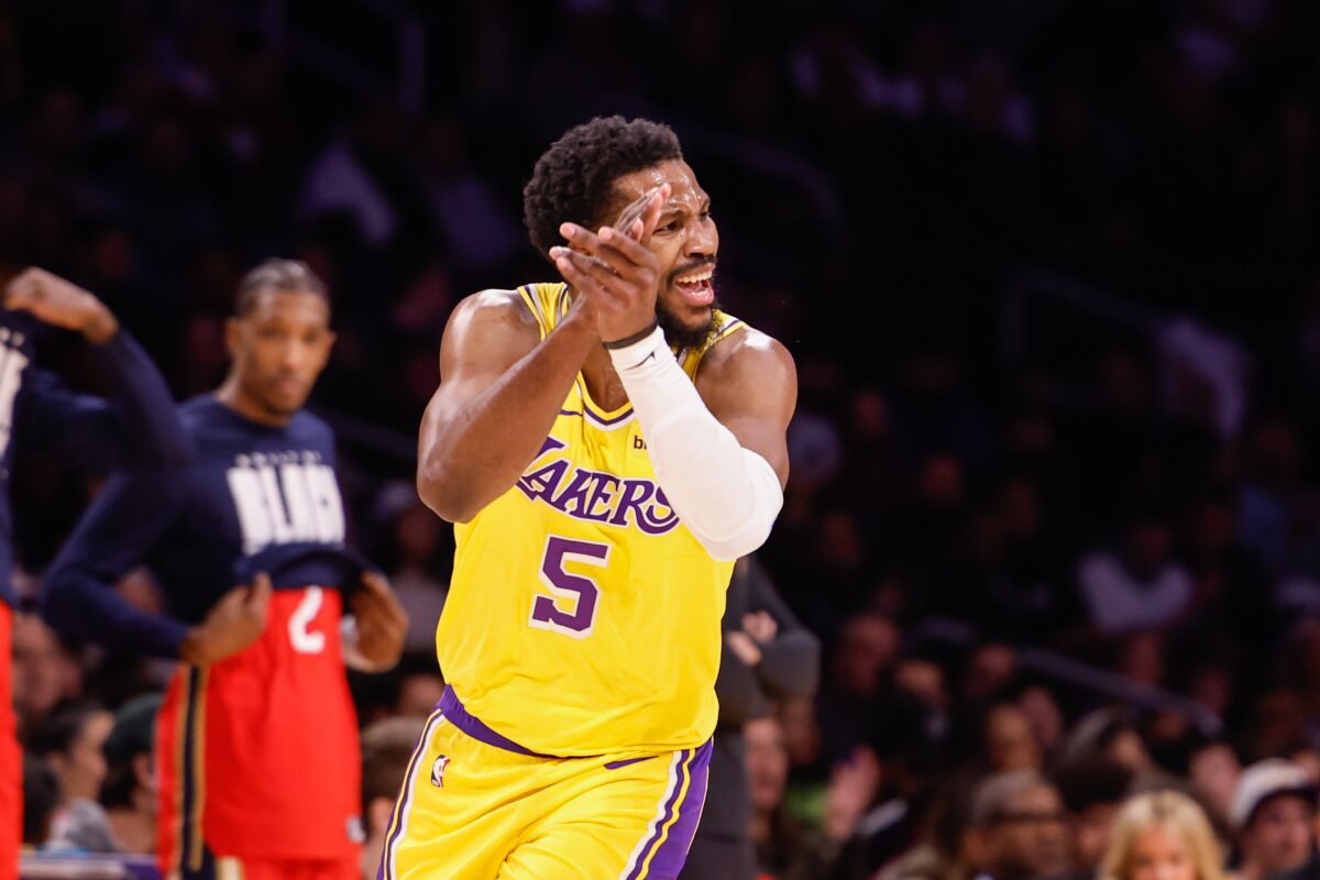 Lakers guard Malik Beasley claps his hands after making a shot against the Pelicans last week.