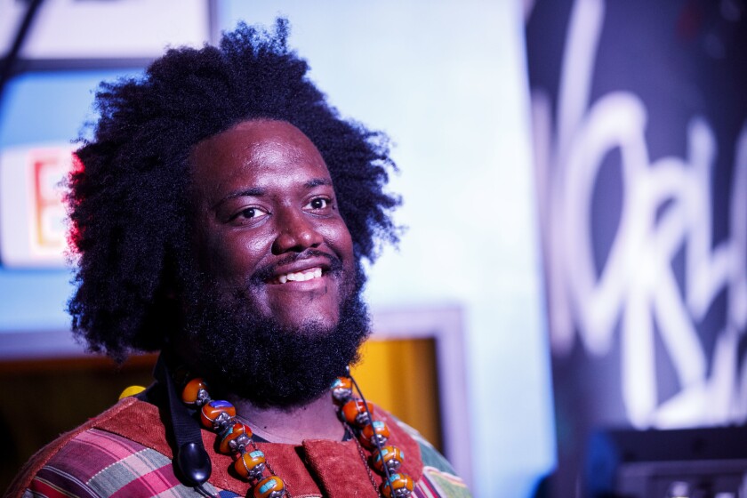 Kamasi Washington is shown at his "Heaven and Earth" album release party June 21 at the World Stage in Leimert Park.