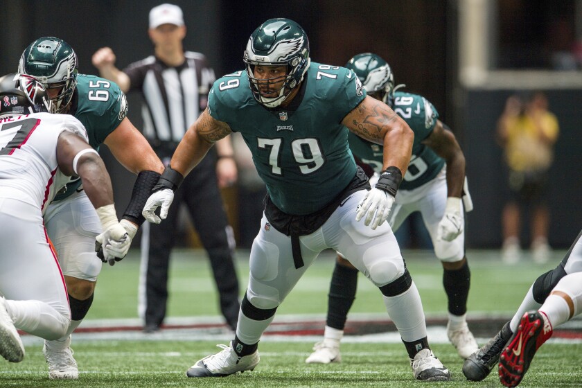 FILE - Philadelphia Eagles offensive guard Brandon Brooks (79) looks to block during the first half of an NFL football game against the Atlanta Falcons, on Sept. 12, 2021, in Atlanta. Brooks announced his retirement Wednesday, Jan. 26, 2022, after 10 seasons in the NFL. (AP Photo/Danny Karnik)