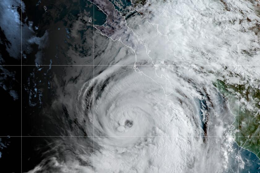 This satellite image made available by NOAA shows Hurricane Kay off the Pacific coast of Mexico
