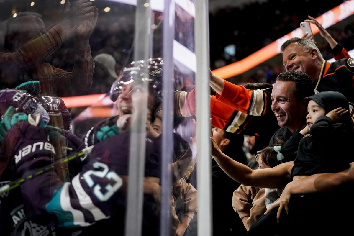 Ducks center Mason McTavish (23) celebrates and fans cheer against the Vegas Golden Knights at Honda Center.