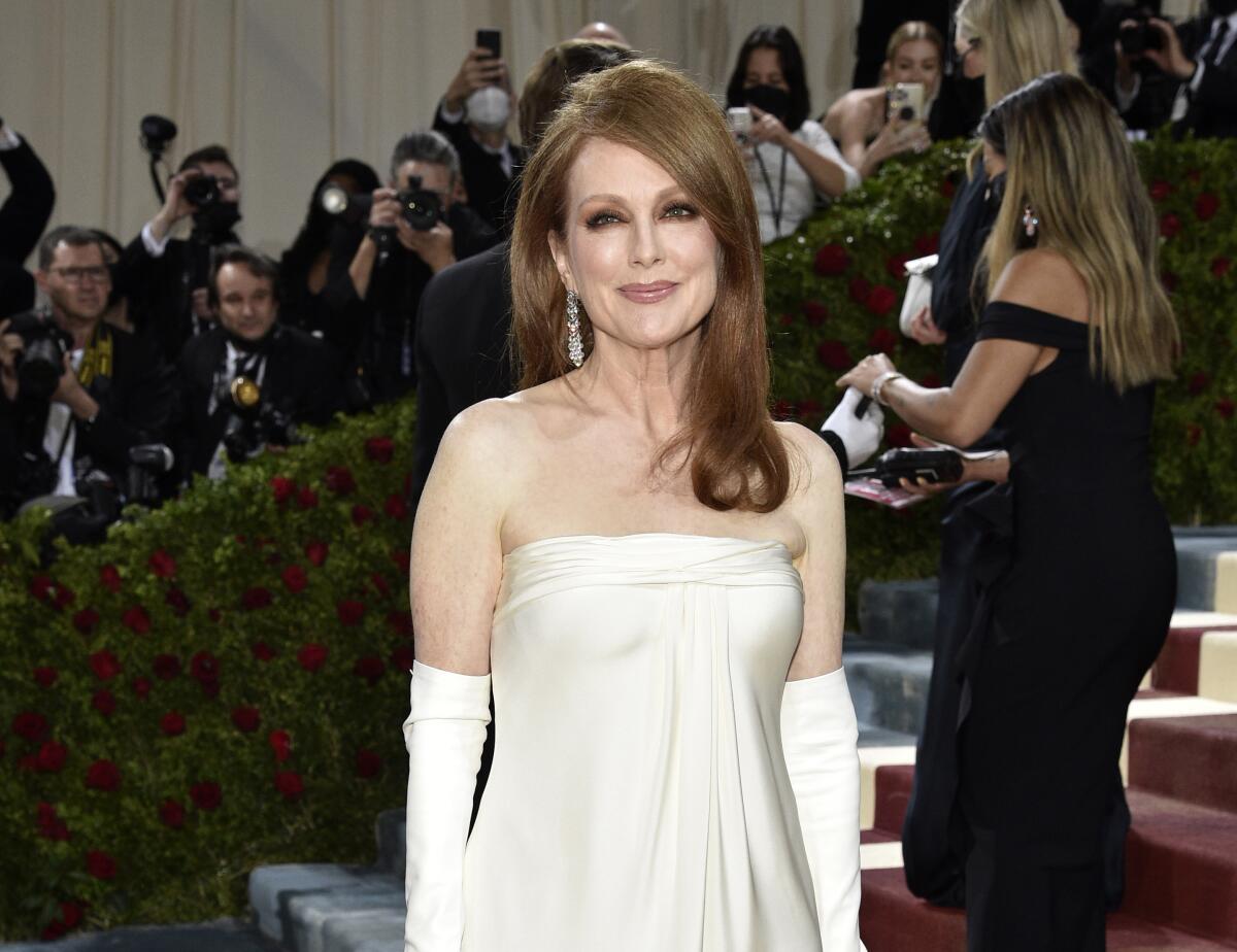 FILE - Julianne Moore appears at The Metropolitan Museum of Art's Costume Institute benefit gala in New York on May 2, 2022. Moore will be the president of the International Jury of the Competition at the 79th Venice International Film Festival. (Photo by Evan Agostini/Invision/AP, File)