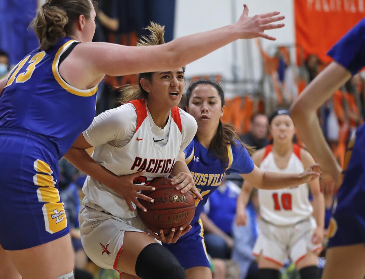 Annika Jiwani drives to the basket in the CIF Southern Section Division 5A girls' basketball championship.