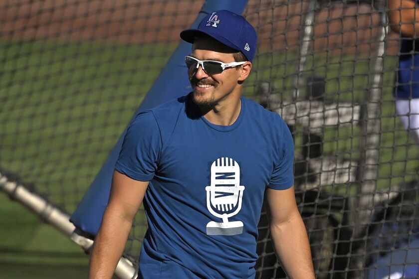 Los Angeles Dodgers' Enrique Hernandez smiles during batting practice.