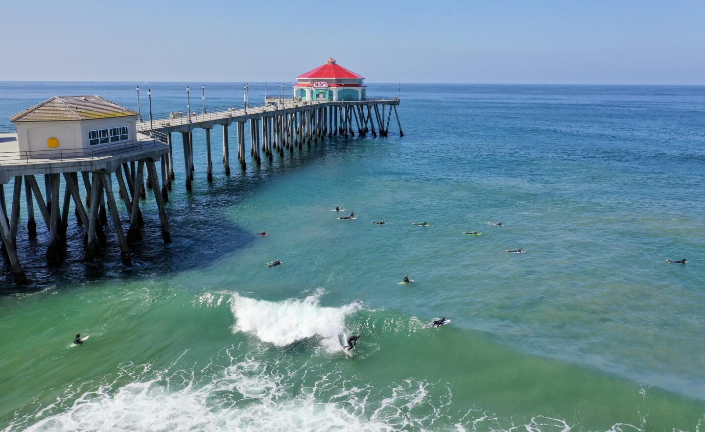 Surfers in Huntington Beach