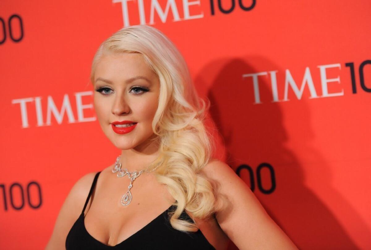 Singer Christina Aguilera may be coming back to "The Voice" with a bigger paycheck.