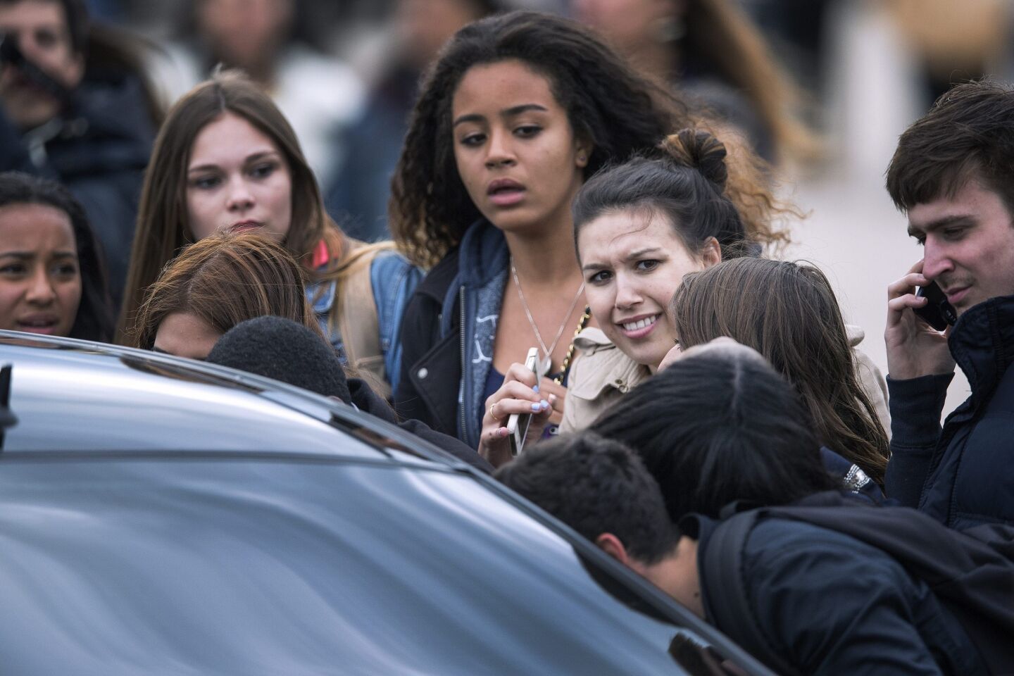 Fans were gathered outside Versailles awaiting Kim Kardashian and Kanye West's arrival on May 23.