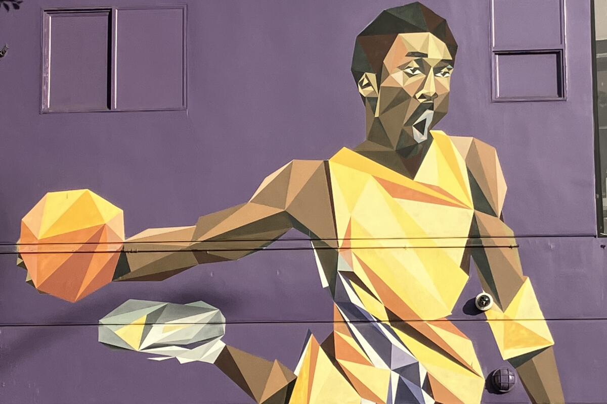 A mural outside Shoe Palace on Melrose Ave. pays tribute to Kobe Bryant.