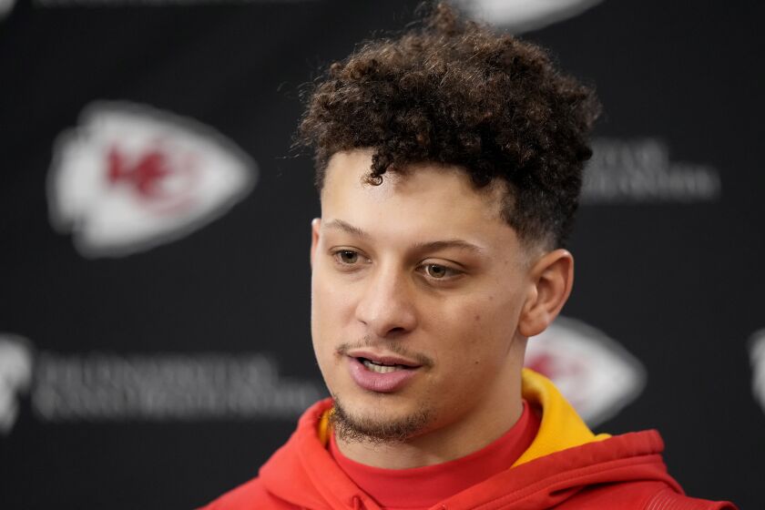 Kansas City Chiefs quarterback Patrick Mahomes talks to the media before an NFL football workout Thursday, Feb. 2, 2023, in Kansas City, Mo. The Chiefs are scheduled to play the Philadelphia Eagles in Super Bowl LVII on Sunday, Feb. 12, 2023. (AP Photo/Charlie Riedel)